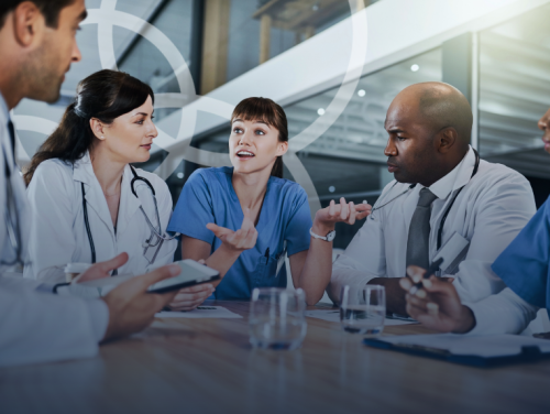 A cross-disciplinary medical team consulting on patient care for a brain tumor.